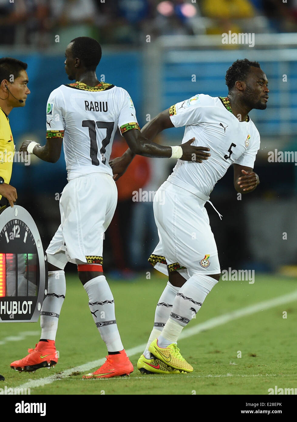 Natal, Brazil. 16th June, 2014. Mohammed Rabiu (L) of Ghana is substituted by Michael Essien during the FIFA World Cup 2014 group G preliminary round match between Ghana and the USA at the Estadio Arena das Dunas Stadium in Natal, Brazil, 16 June 2014. Credit:  dpa picture alliance/Alamy Live News Stock Photo