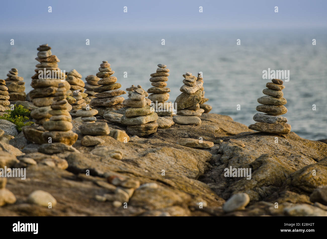 pebble piramids on sea shores of quiberon Stock Photo