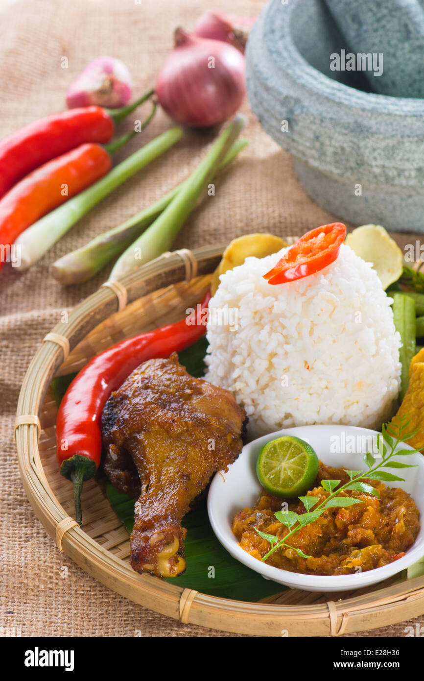 indonesian fried chicken rice Stock Photo - Alamy