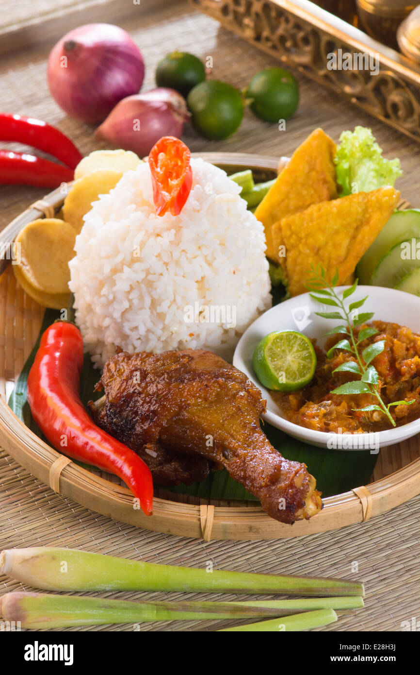 indonesian fried chicken rice Stock Photo - Alamy