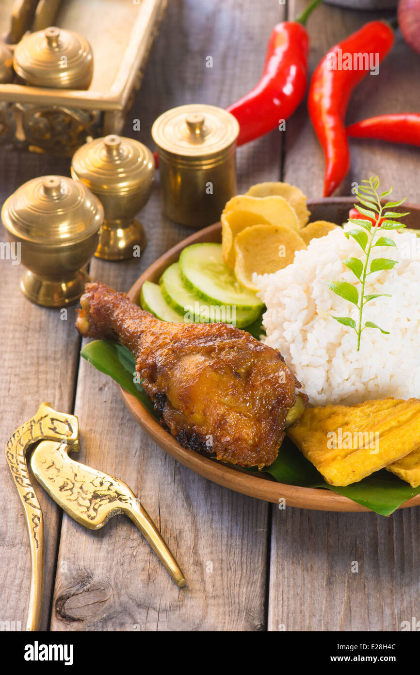 indonesian fried chicken rice Stock Photo - Alamy