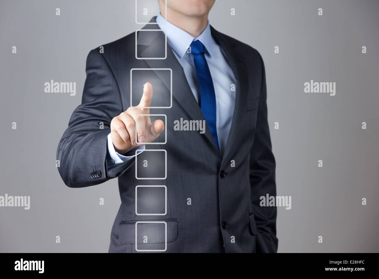 Business Man pushing on a touch screen interface Stock Photo - Alamy