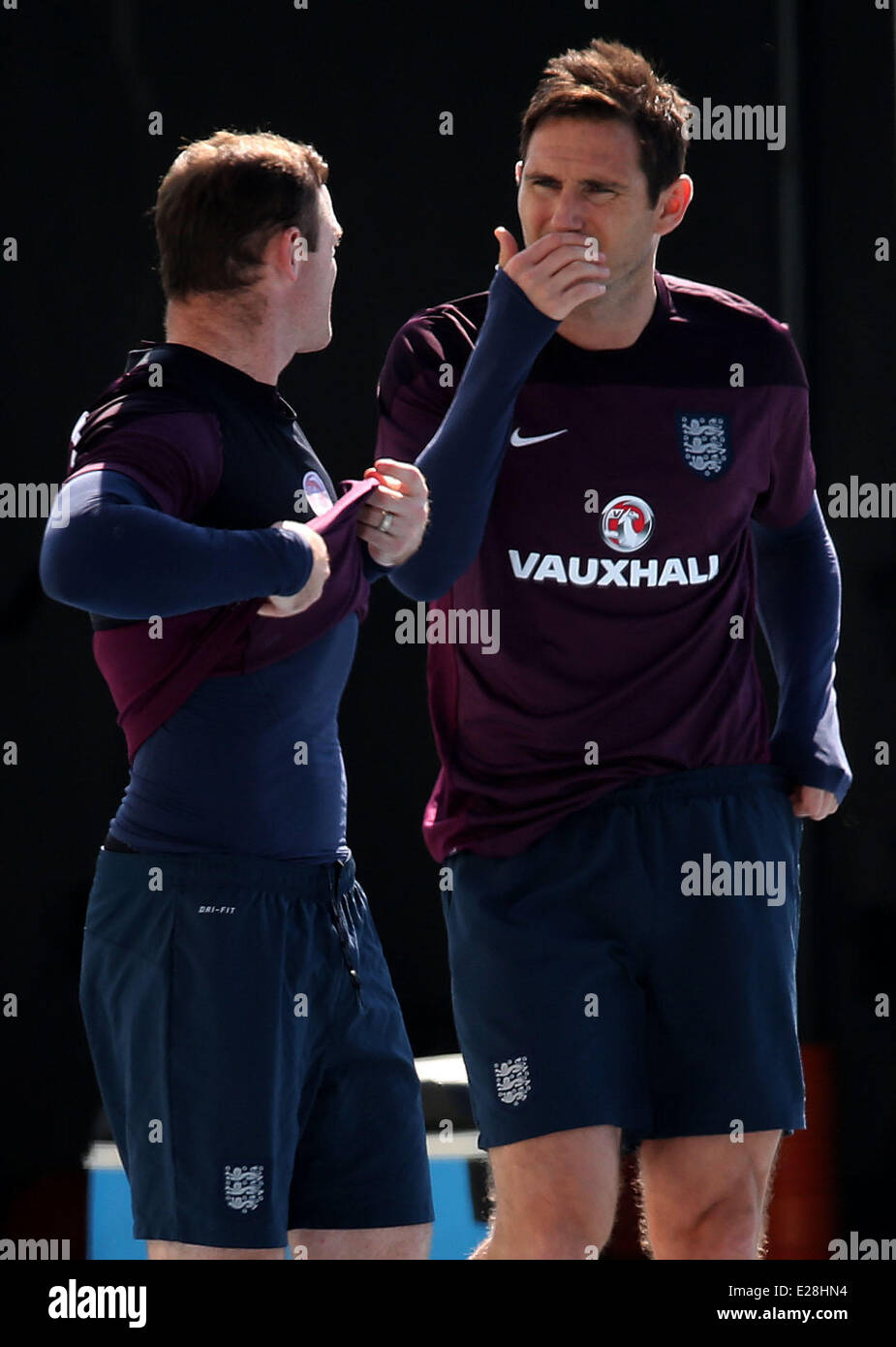Rio de Janeiro, Brazil. 16th June, 2014. England's players, Wayne Rooney (L) and Frank Lampard during training conducted at the Center for Army Physical Training, in Urca, south zone of Rio de Janeiro, southeastern Brazil, on June 16, 2014. Britain faces Uruguay on Thursday, 19, at the Arena Corinthians, in Sao Paulo, in their second game of the World Cup. Credit:  dpa picture alliance/Alamy Live News Stock Photo