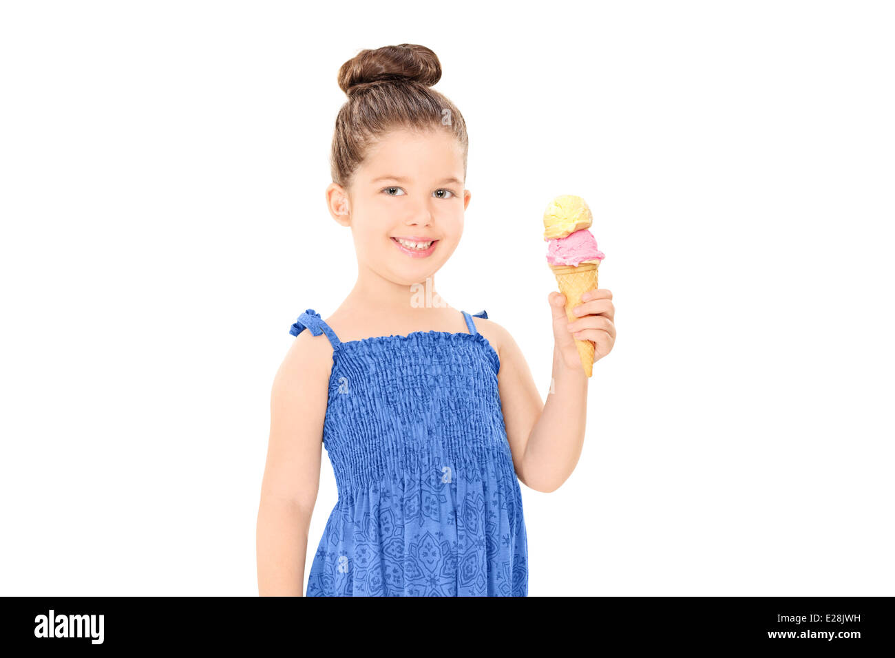 Joyful little girl holding an ice cream Stock Photo