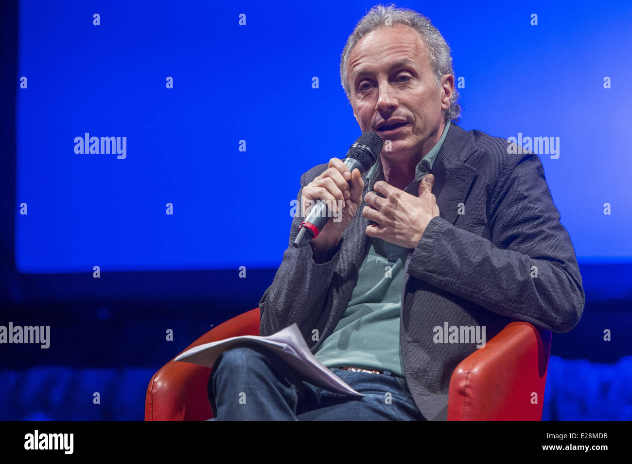 Turin, Italy. 16th June, 2014. Marco Travaglio vice director of ''Il Fatto quotidiano''presents his book ''E' stato Mafia.'' An intense monologue, in which he tells the taboo-negotiation between the state and the mafia, carried out by men of the institutions and leaders of Cosa Nostra during the bloody years 1992 and 1993. Credit:  Mauro Ujetto/NurPhoto/ZUMAPRESS.com/Alamy Live News Stock Photo