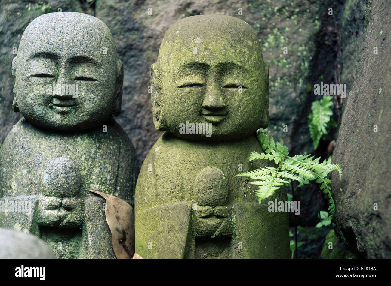 small sculptures of Jizo deities in Japanese forest Stock Photo Alamy
