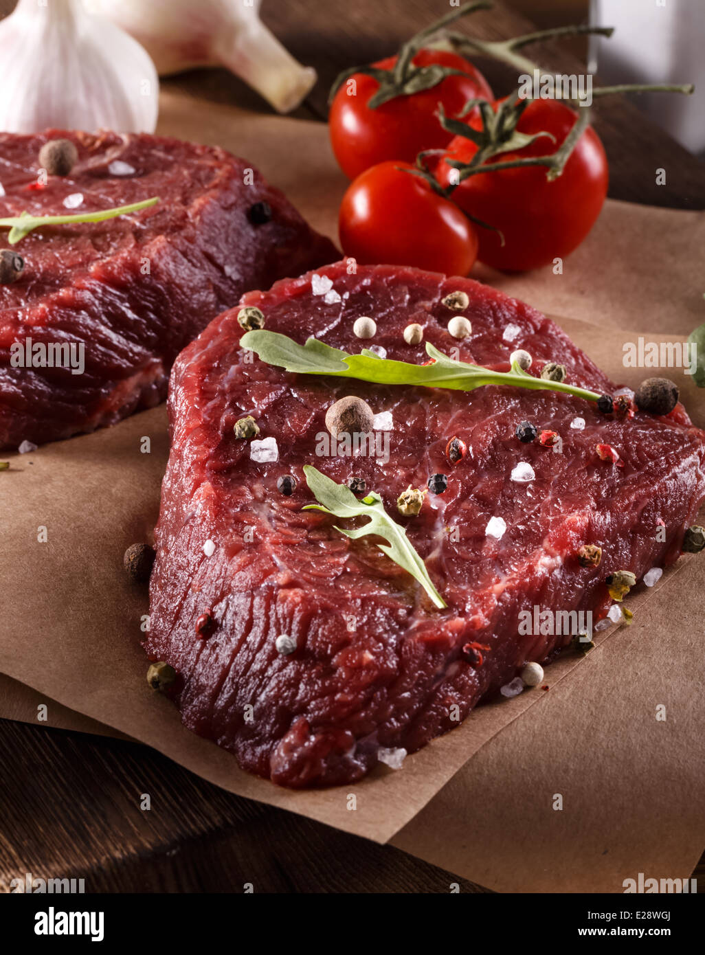 Succulent tender raw lean beef steaks Stock Photo