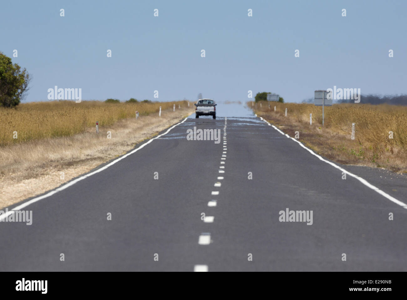View of road with mirage in heat, South Australia, Australia, February Stock Photo