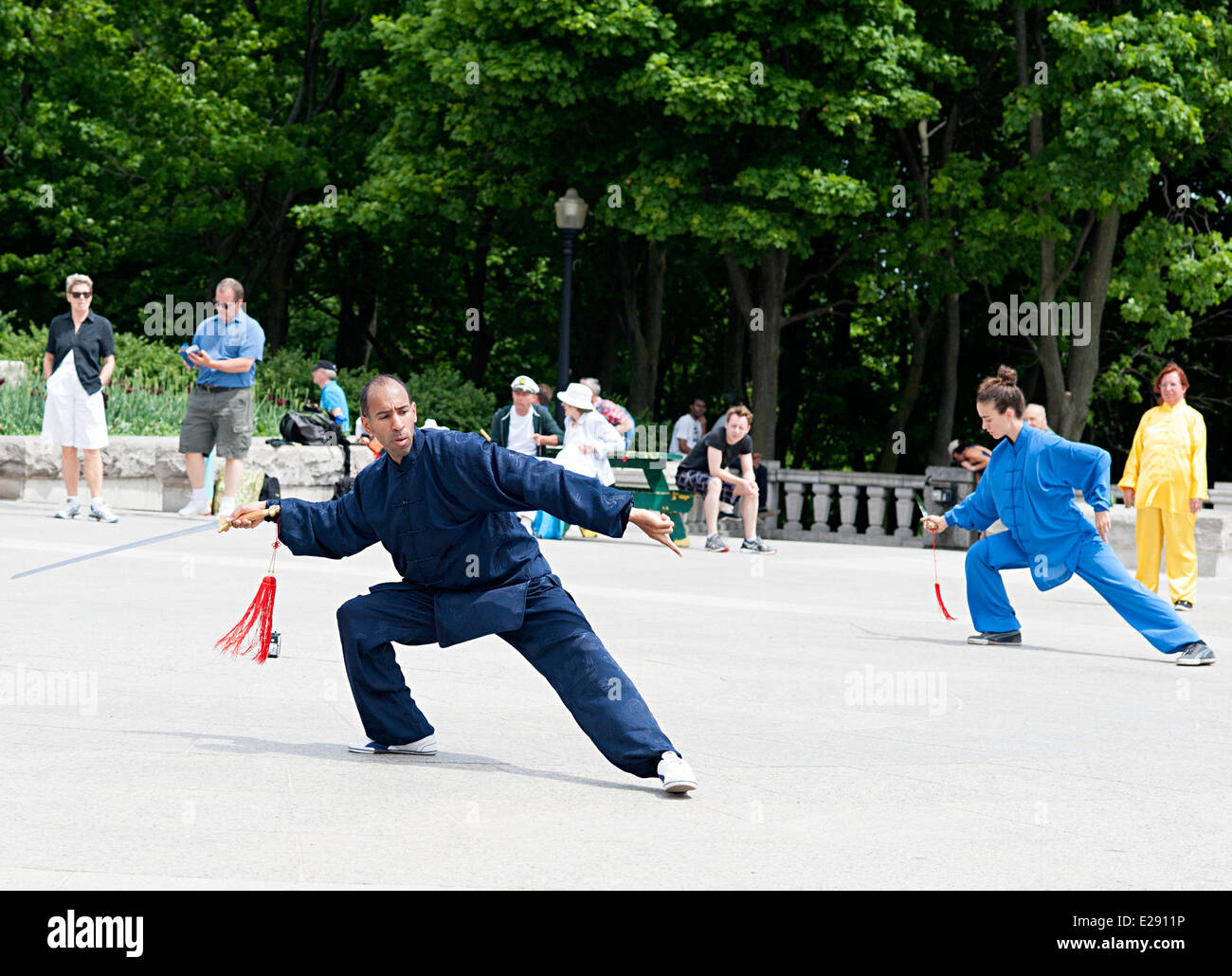 Tai chi professionals exercise on Mount Royal plaza in Montreal, Quebec Canada. Stock Photo