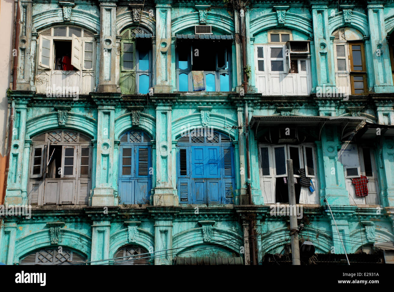 Dilapidated colonial era tenement block in city, Central Yangon, Myanmar, January Stock Photo