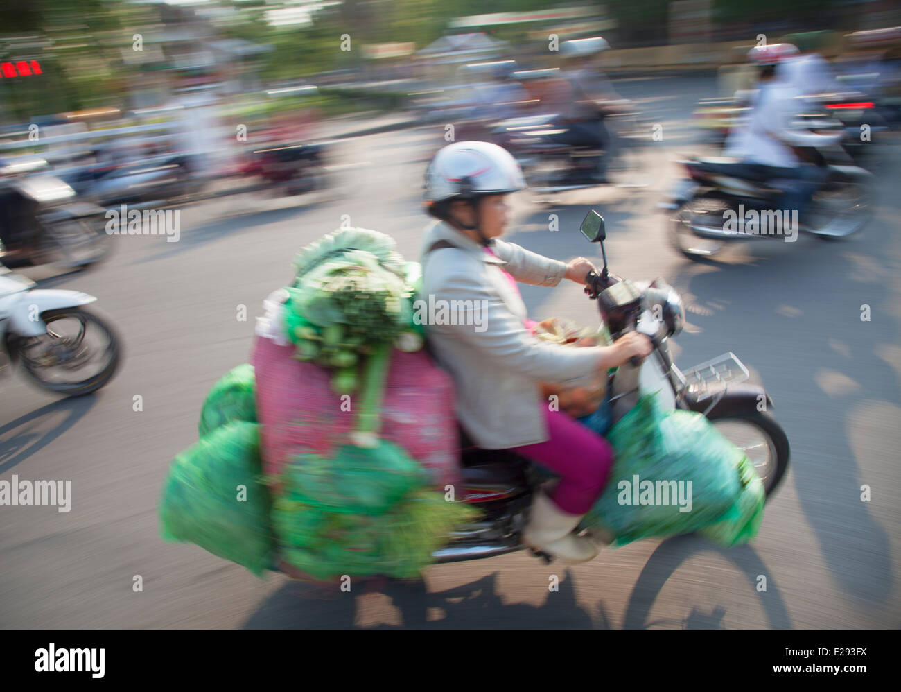 Vietnamese Motorcycle Rider Vietnamese woman riding motorcycle hi-res stock photography and images ...