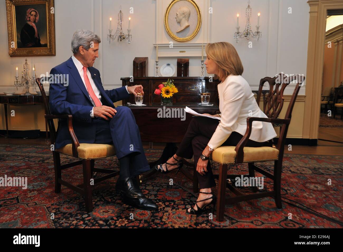 US Secretary of State John Kerry is interviewed by Yahoo! News Reporter Katie Couric before at the Department of State June 16, 2014 in Washington, DC. Stock Photo