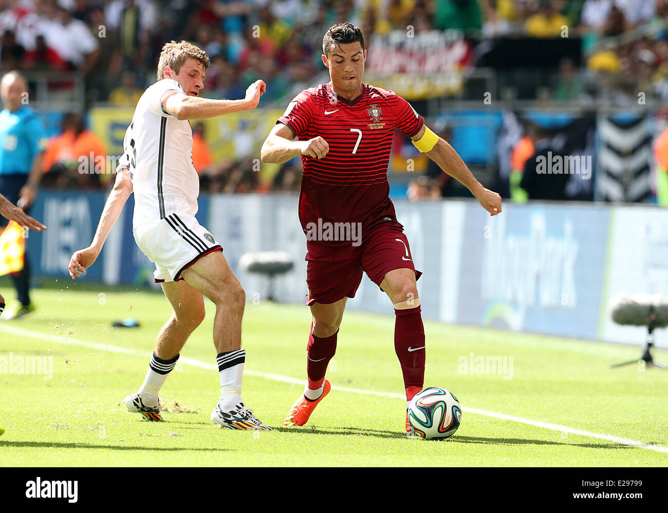 Savador, Brazil. 16th June, 2014. World Cup finals 2014. Germany versus Portugal. Cristiano Ronaldo challenged by Thomas Mueller Credit:  Action Plus Sports/Alamy Live News Stock Photo