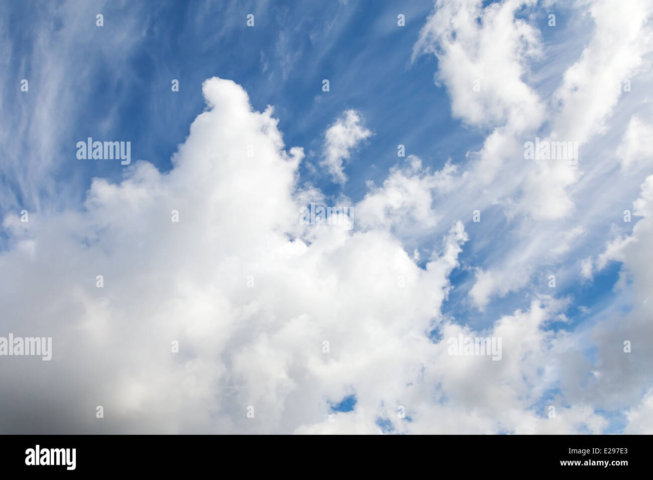 Bright blue sky photo background with white clouds Stock Photo