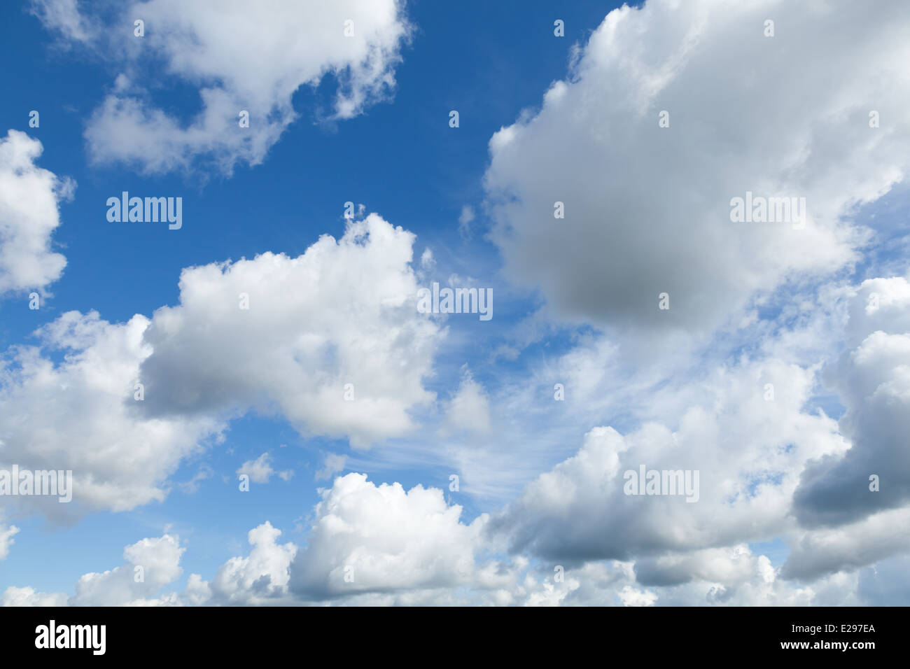 Bright blue sky background with white clouds Stock Photo