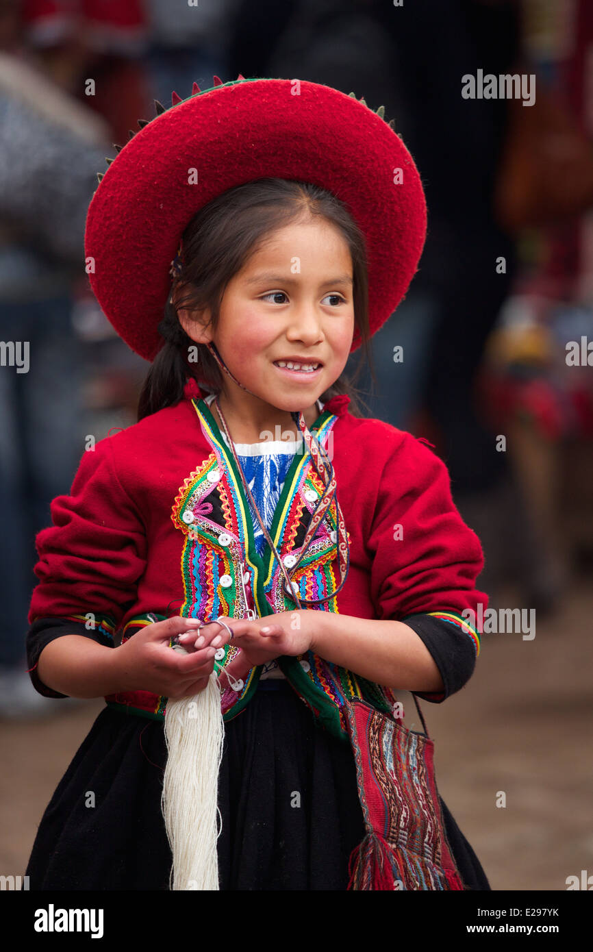 A young weaver girl child in Chinchero, Peru Stock Photo