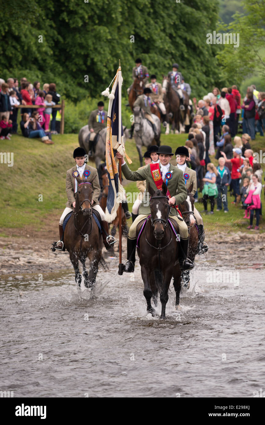 Selkirk Common Riding 2014. The Standard Bearer and attendants ford the