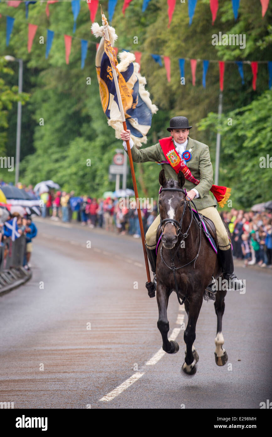 Selkirk Common Riding 2014. The Standard Bearer gallops in at the Toll