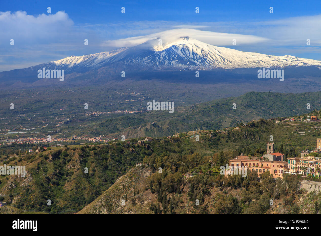 View of Mount Etna covered of snow from Taormina Stock Photo