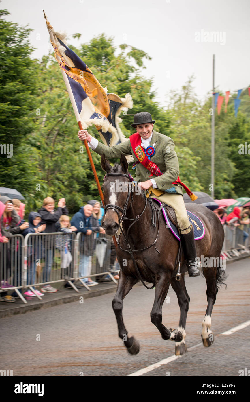 Selkirk Common Riding 2014. The Standard Bearer gallops in at the Toll
