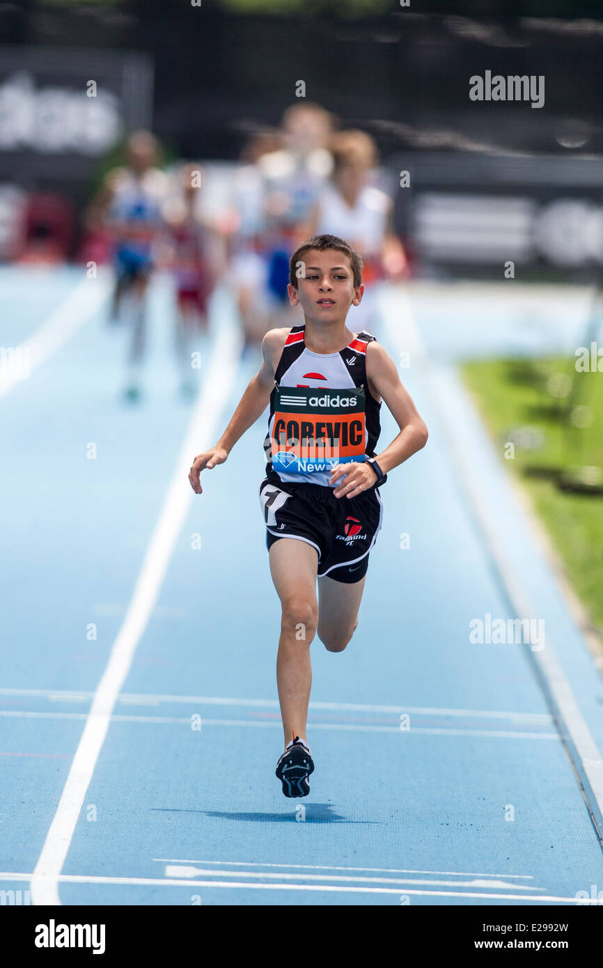 Johan Gorevic (USA) a sixth grader from Rye, NY ran the fastest-ever mile by a 10 year old during the Adidas Grand Prix Stock Photo