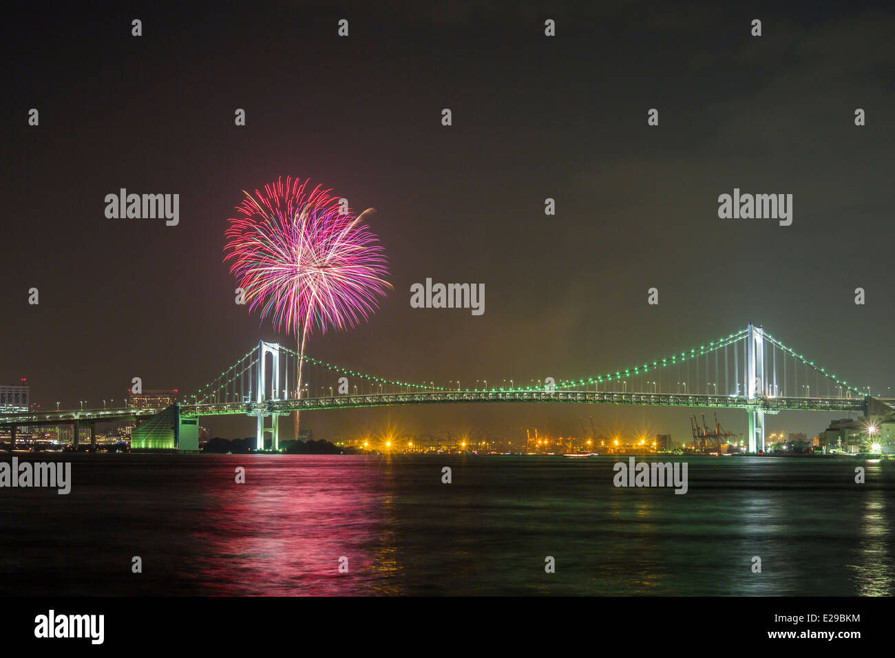 Fireworks and Rainbow Bridge, Tokyo, Japan Stock Photo