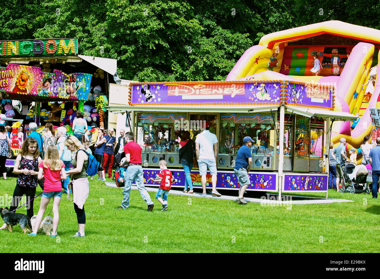 Family day out with fairground stalls for all ages Autokarna 2014 Wollaton Park Nottingham England Stock Photo