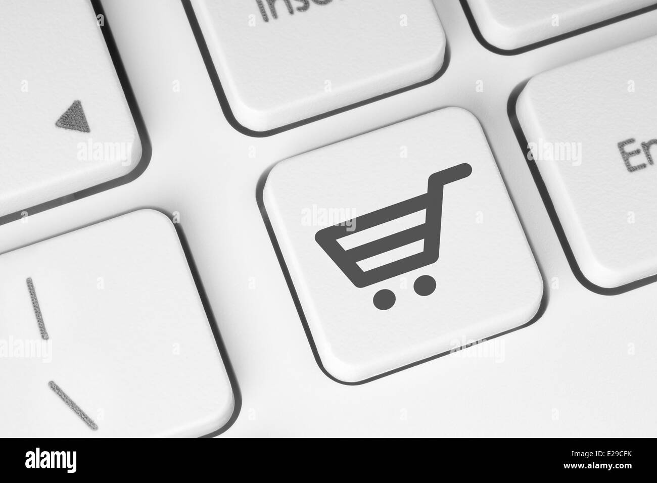 Shopping cart icon on keyboard key closeup Stock Photo Alamy