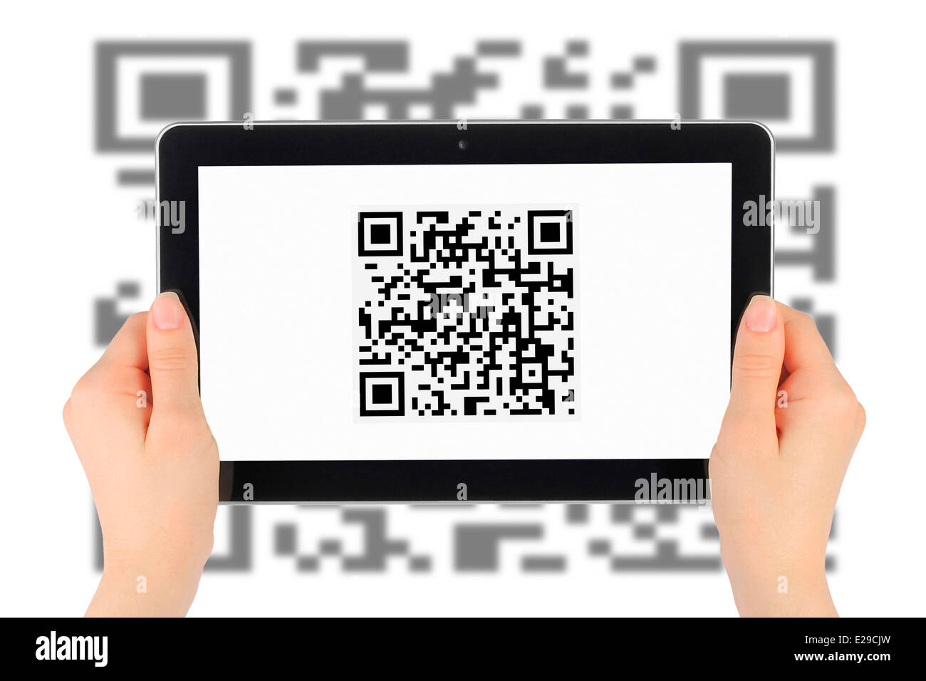 Scanning of QR code by tablet pc Stock Photo