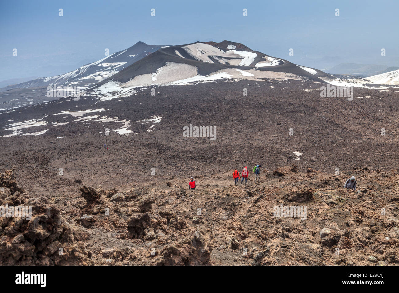 Hikers climbing toward mount Etna summit Stock Photo Alamy