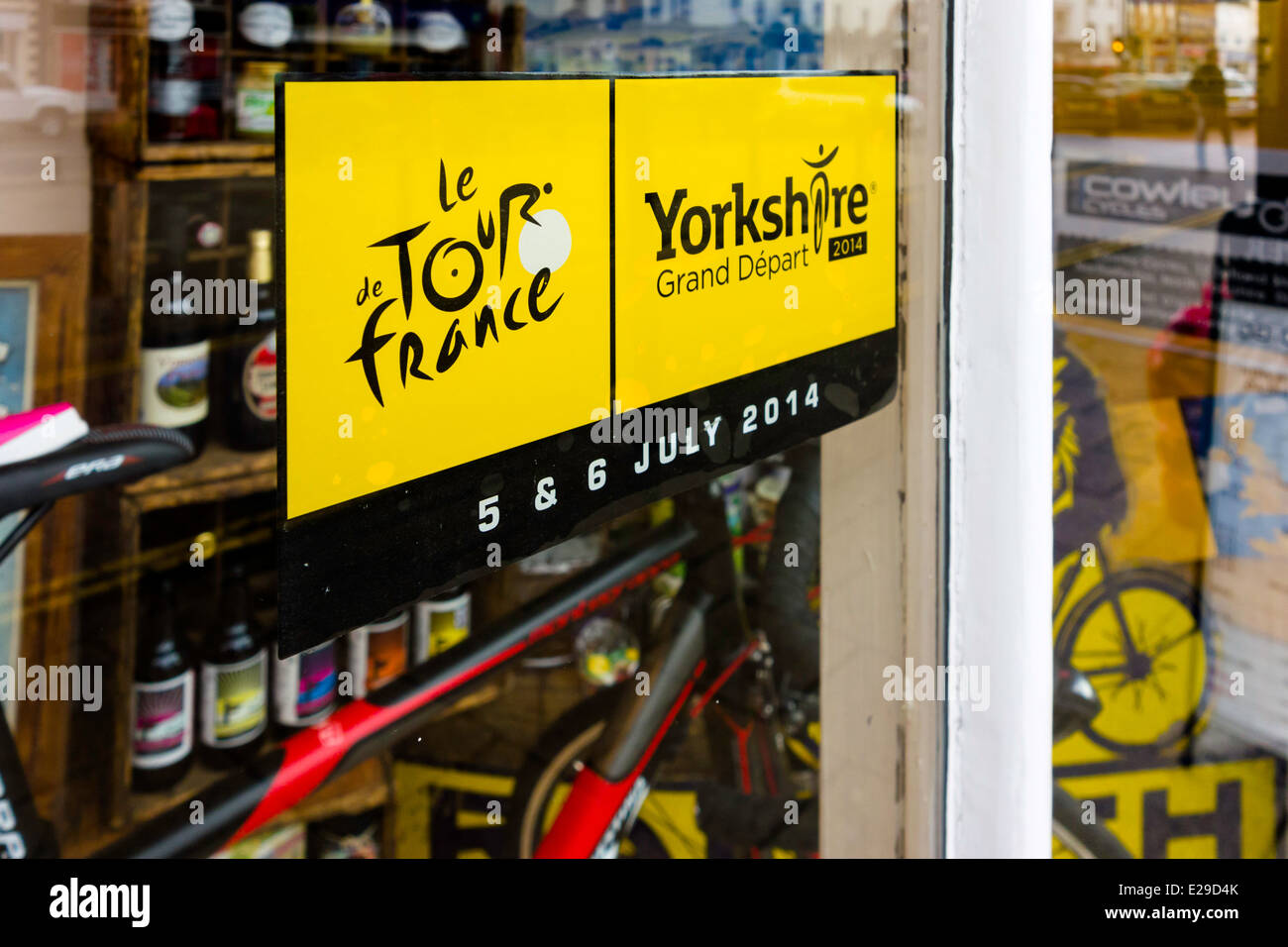Yorkshire grocers shop window June 2014 decorated with cycling memorabilia for the Tour de France cycle race in July Stock Photo