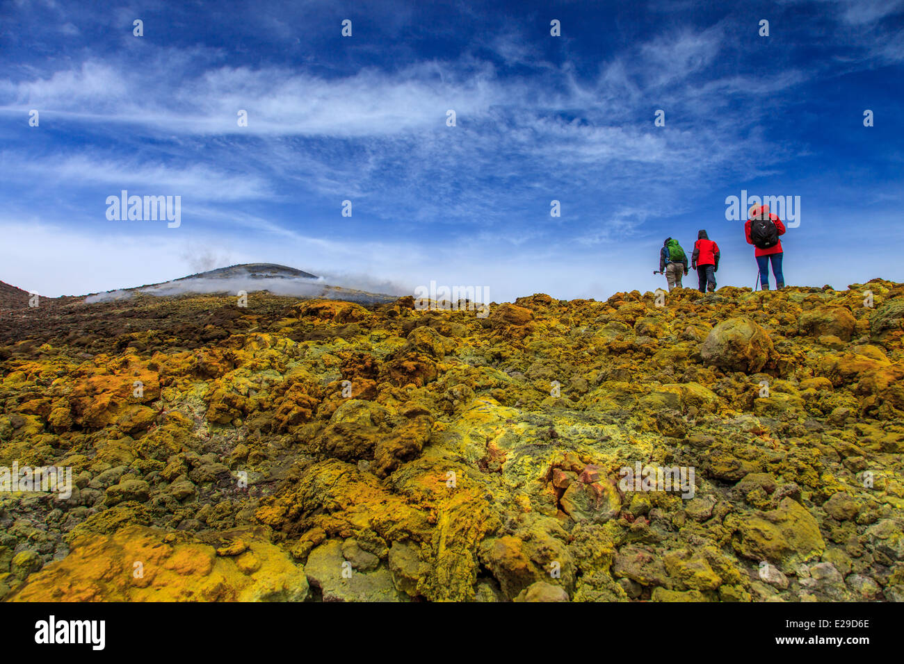 Hikers reaching summit of Mount Etna Stock Photo