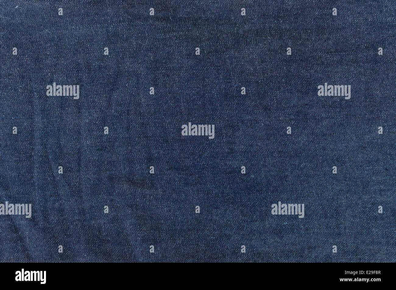 Close up of dark blue jeans texture for background Stock Photo - Alamy