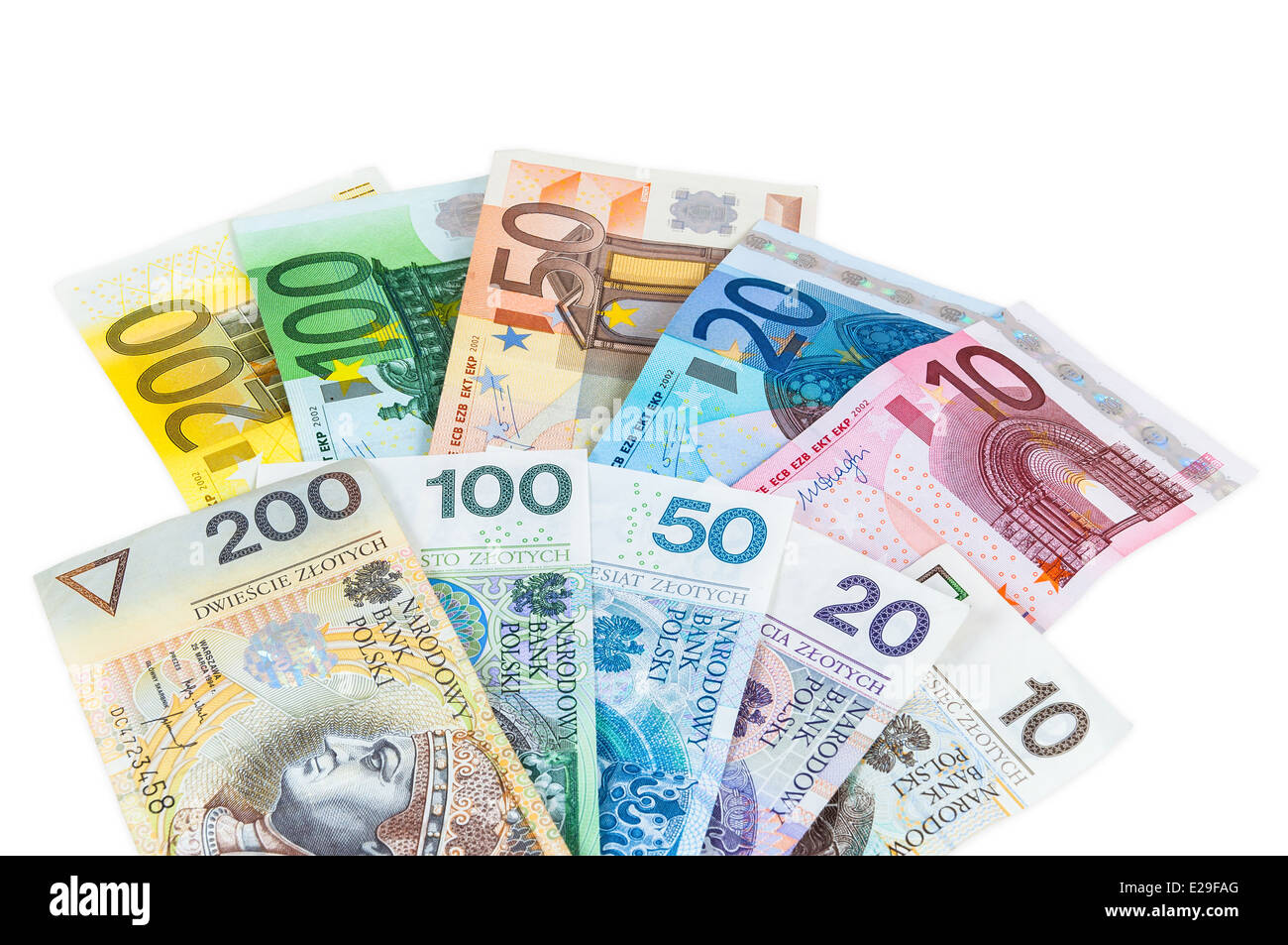 Euro and new polish zloty banknotes isolated on white background with  clipping path Stock Photo - Alamy