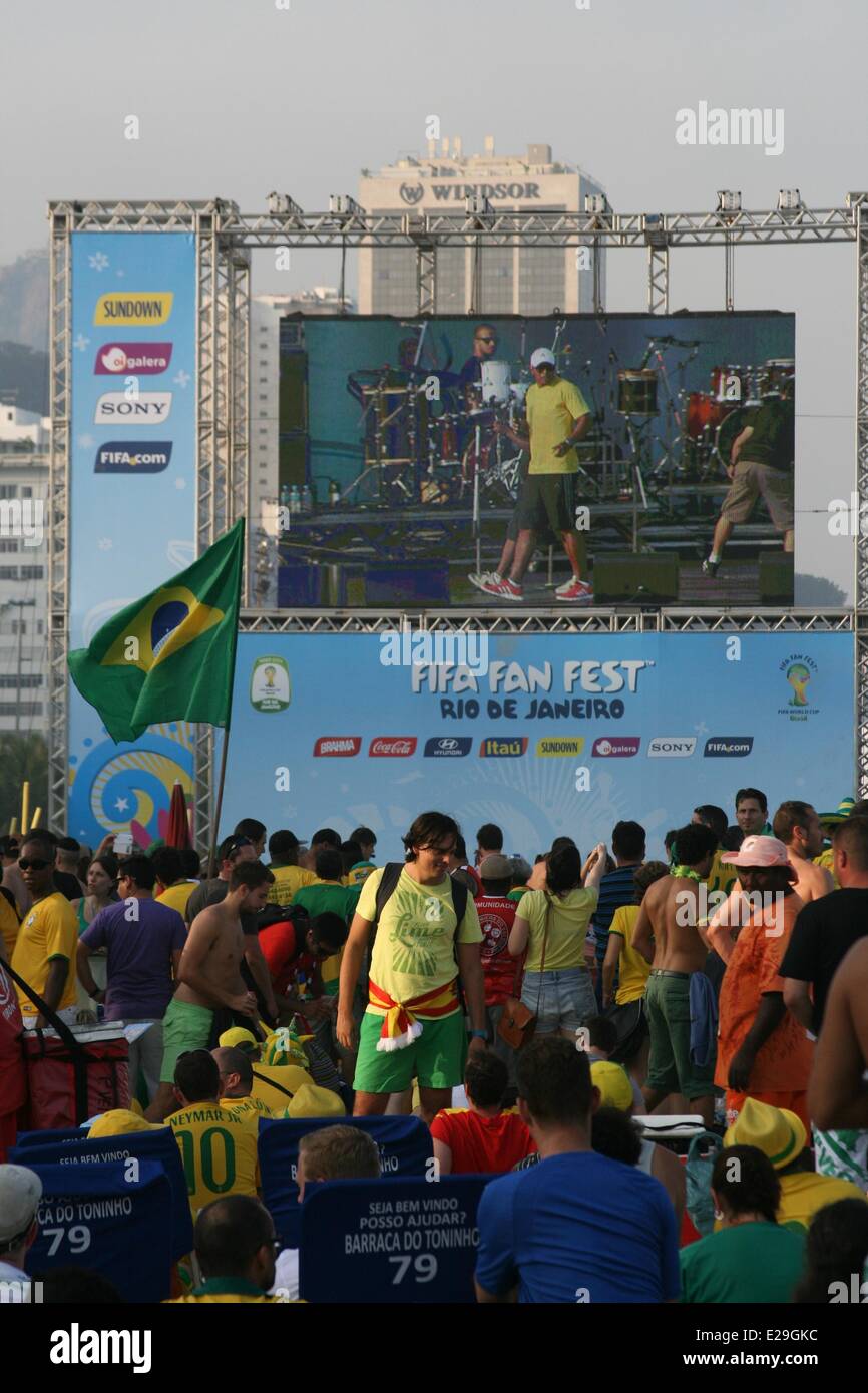 Rio de Janeiro, Brazil, 17th June, 2014. 2014 FIFA World Cup Brazil. Football fans gather in front of FIFA Fan Fest's secondary screen at Copacabana Beach, before the match between Brazil and Mexico. Stock Photo