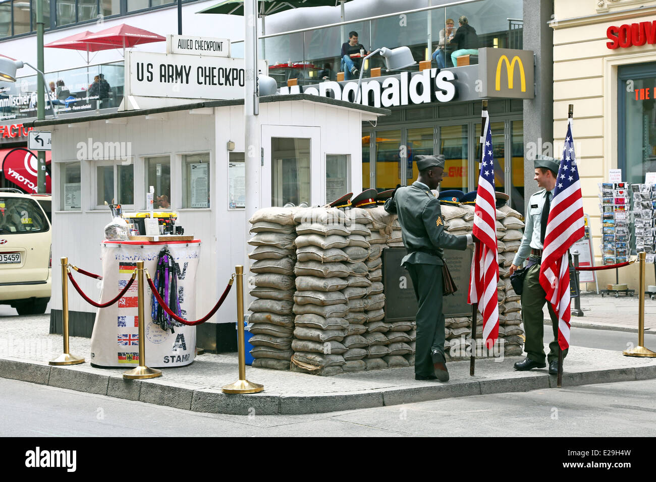 Checkpoint Charlie old East West border crossing post in Friedrichstrasse in Berlin, Germany Stock Photo