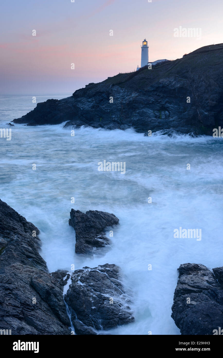 Dawn breaking in the sky above Trevose Head Lighthouse, Cornwall. Stock Photo
