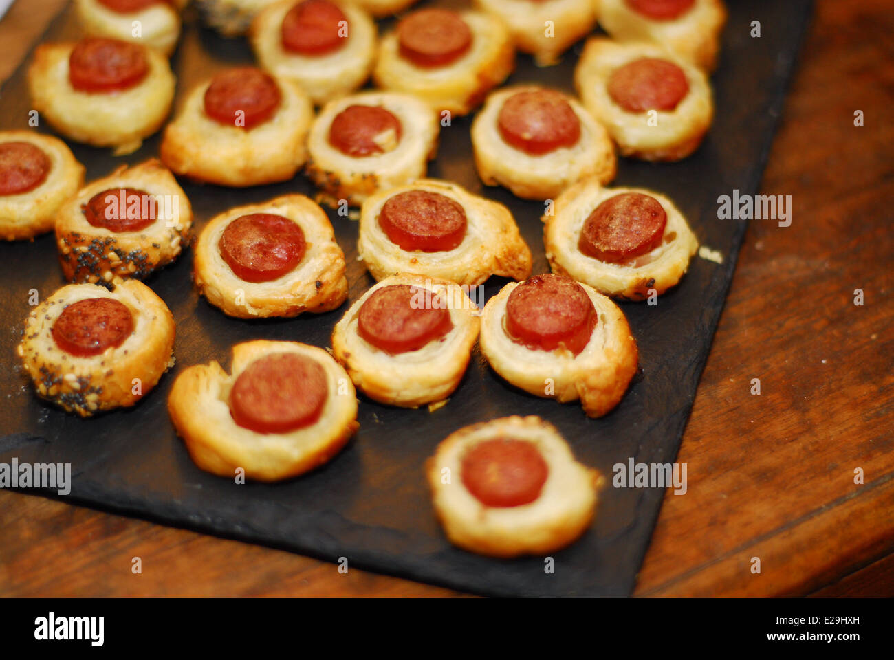 Nibbles served on a slate plate Stock Photo Alamy