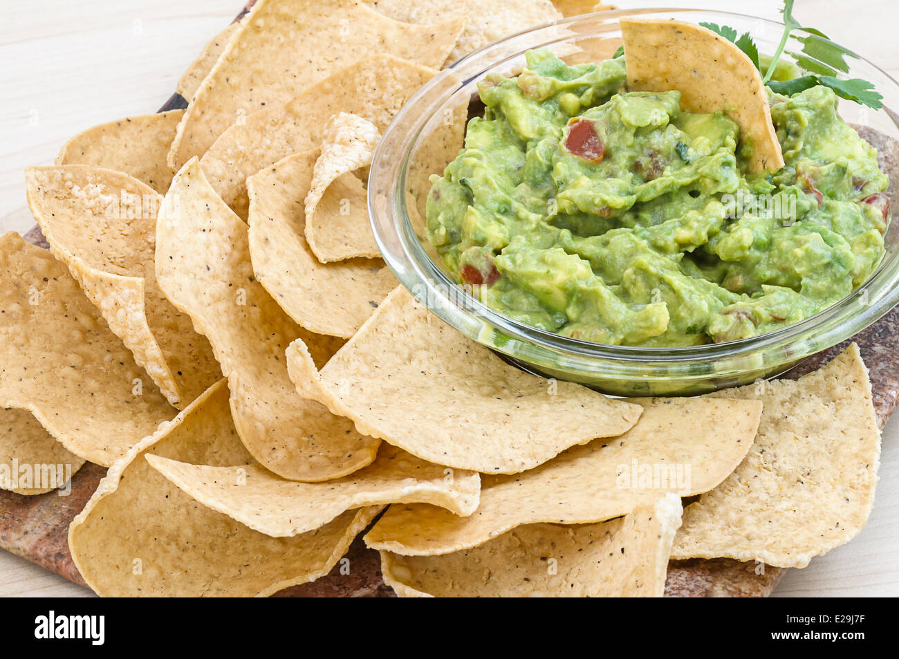 Guacamole with corn tortilla chips Stock Photo Alamy