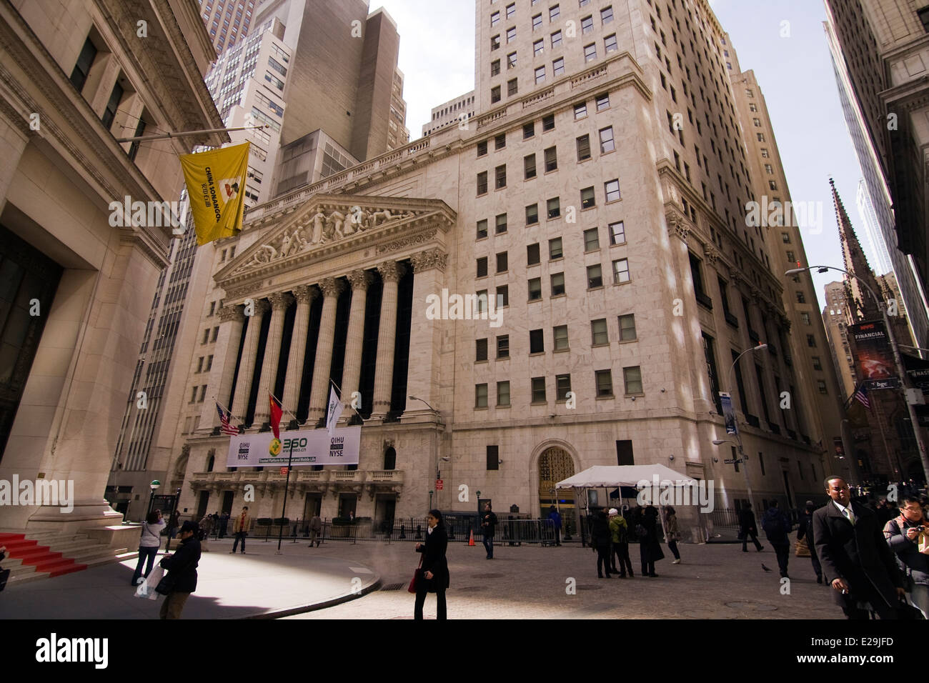 The New York Stock Exchange on the corner of Broad and Wall St in the Lower Manhattan Neighborhood of New York City Stock Photo