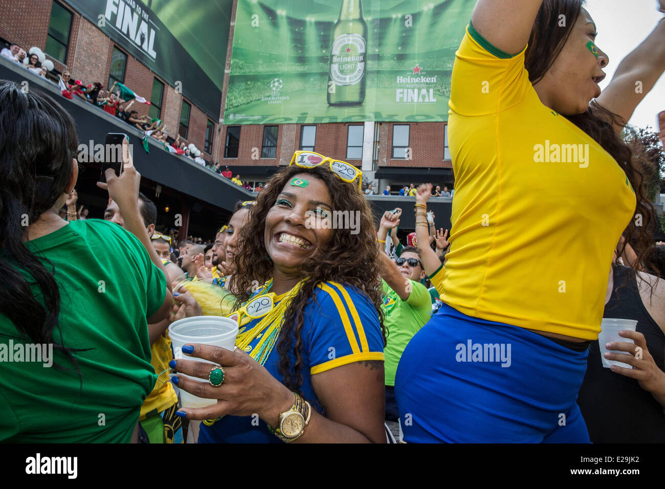 New York, NY, US. 17th June, 2014. Brazil and Mexico soccer fans gathered in New York City to support their national teams in what was one of the most exciting games without goals in world cup history. Both Brazilian fans and Mexican fans were both beyond passionate in supporting their teams and watched the game together in close proximity with good humor and respect for each other. Credit:  Scott Houston/Alamy Live News Stock Photo