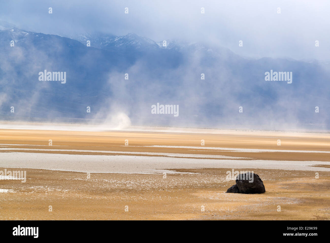 Boulder on a dry lake bed in Northern Nevada. Stock Photo