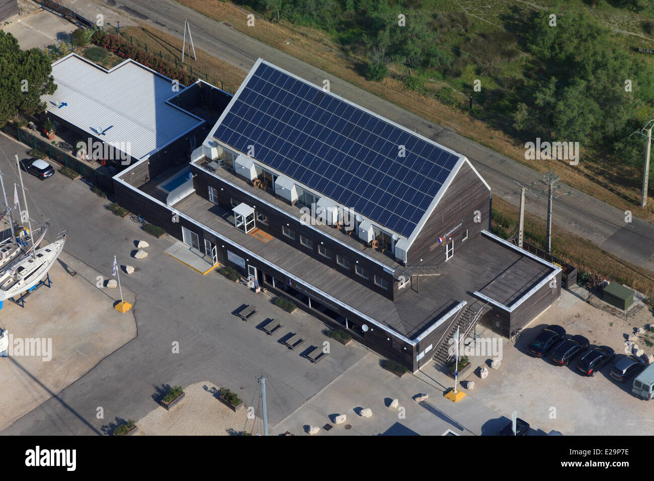 France, Bouches du Rhone, Port Saint Louis du Rhone, Port Napoleon, bar restaurant Josephine, photovoltaic roof (aerial view) Stock Photo
