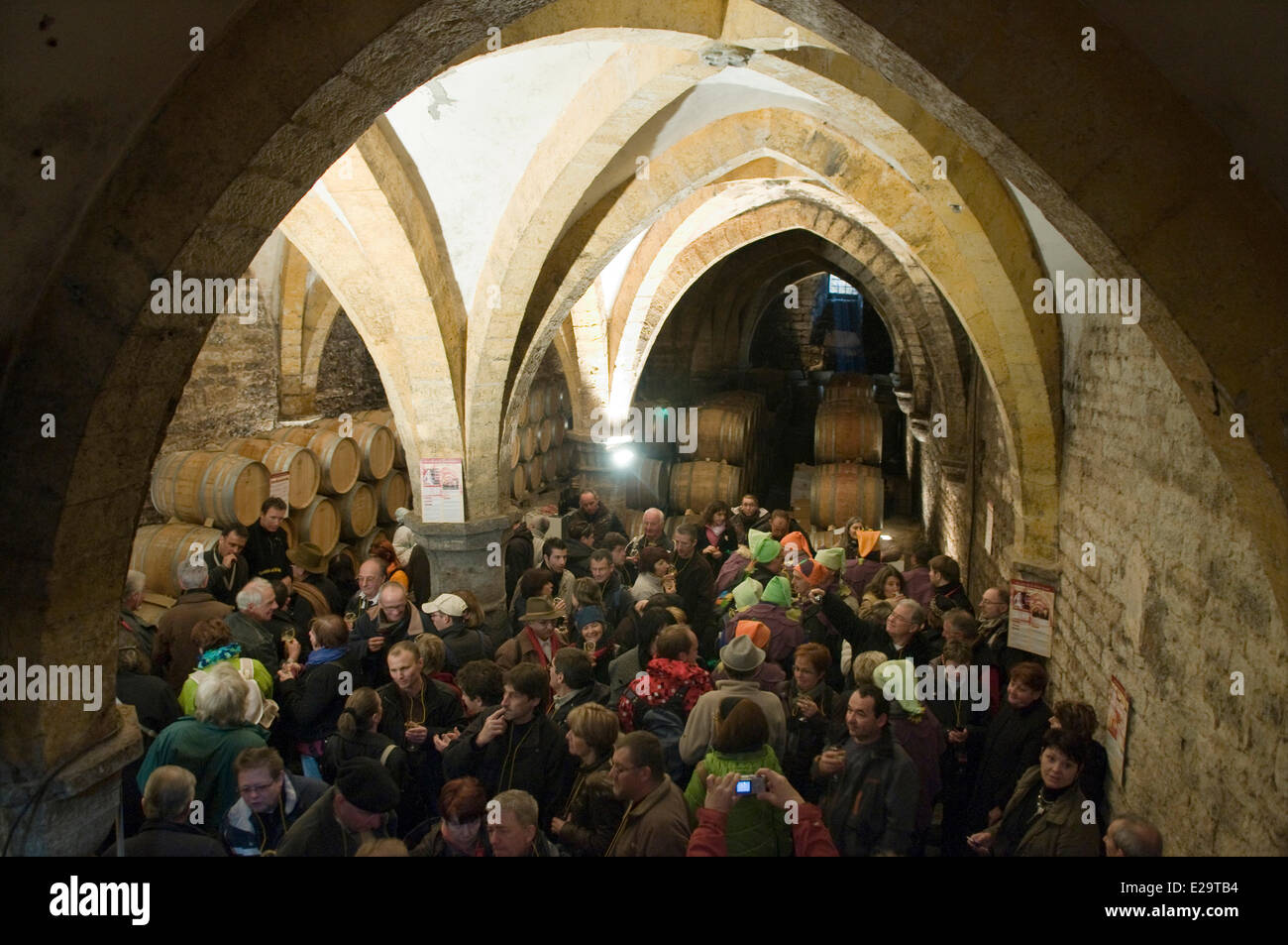 France, Jura, Arbois, breakthrough of the yellow wine, crowd in the cellar of queen Jeanne Stock Photo