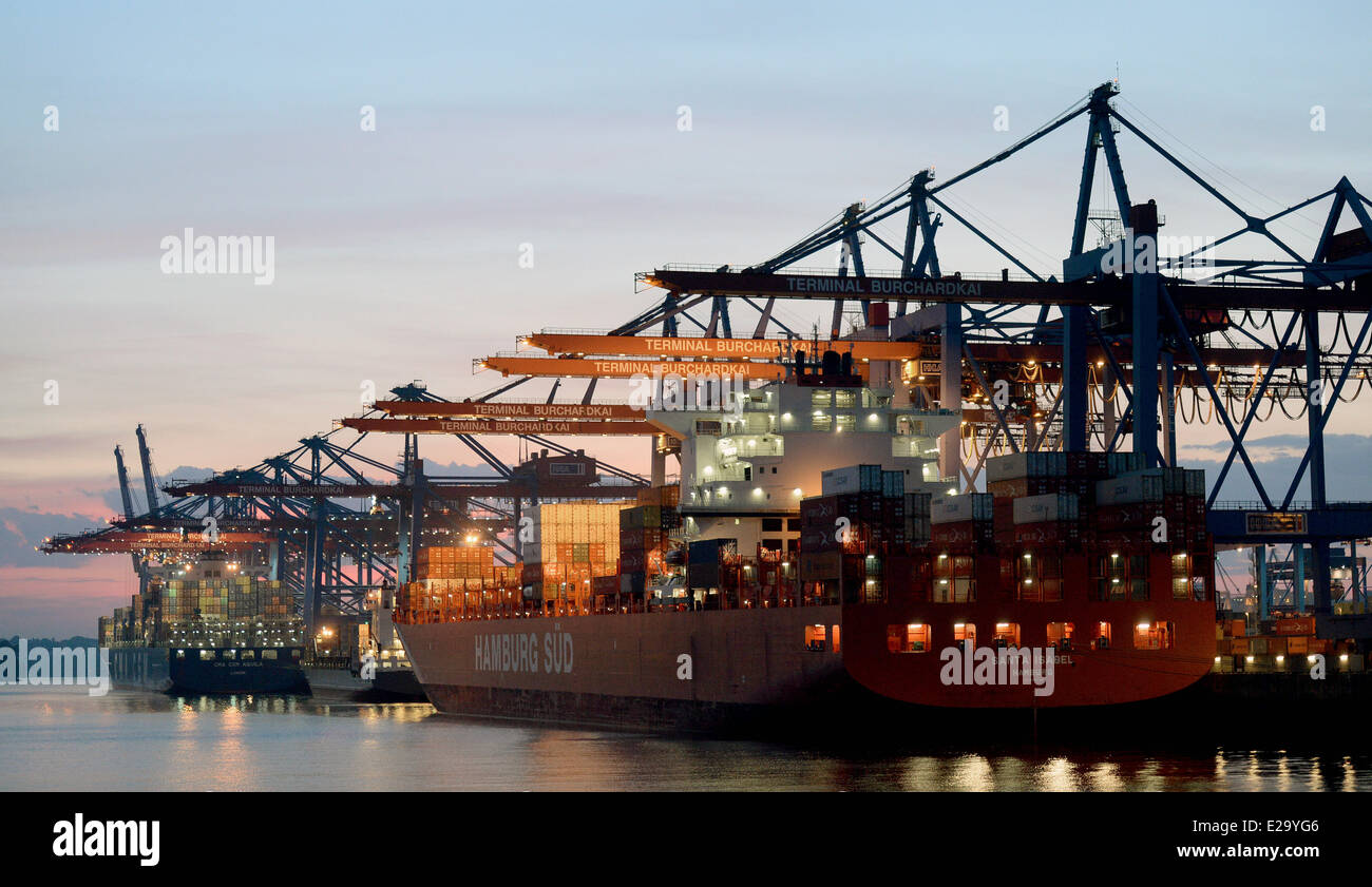 Container ships are docked at the Port of Hamburg, 9 June 2014 in Hamburg. Stock Photo