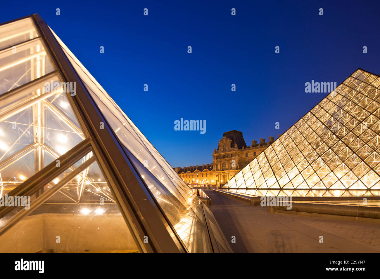 France, Paris, Louvre Museum, the Louvre pyramid by architect Ming Pei Stock Photo