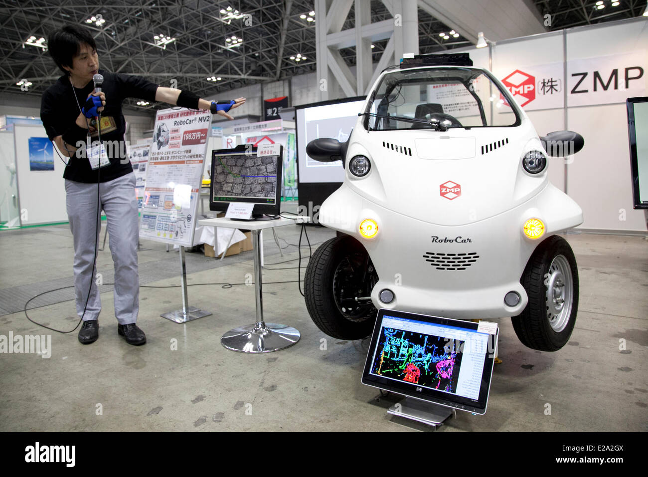Tokyo, Japan. 18th June, 2014. An exhibitor shows the ZMP 'RoboCar' at the Smart Community Japan 2014 in Tokyo Big Sight on June 18, 2014. The exhibition brings the latests products and technologies divided in 5 categories, 'Smart Community Exhibition', 'Biomass Expo', 'Next Generation Vehicle Exhibition, and newly-created 'Community Cloud 2014', which introduces technology for urban development. This year 229 enterprises and organizations shows their products from June 18th to 20th. Credit:  Aflo Co. Ltd./Alamy Live News Stock Photo