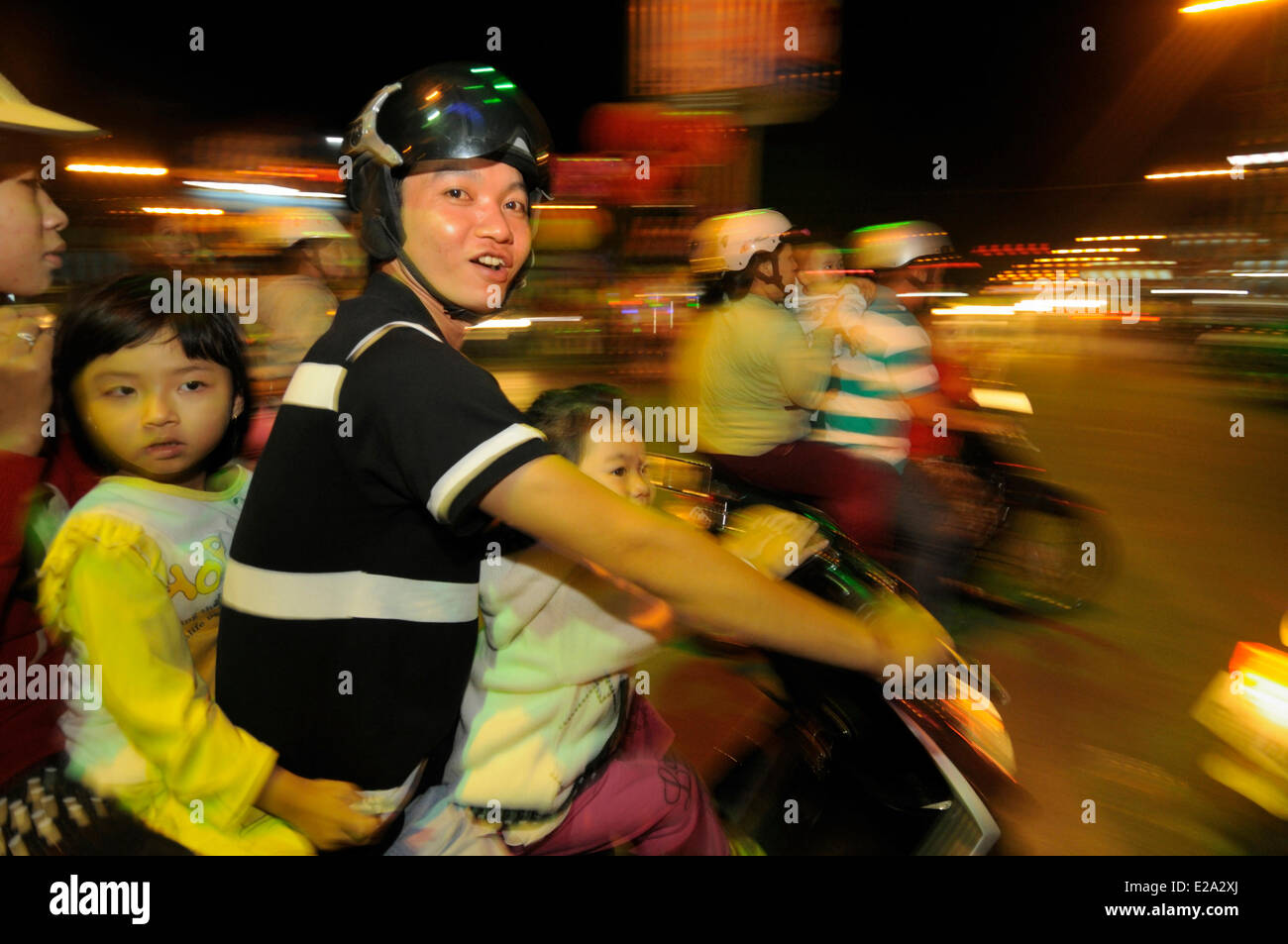 Vietnam, Can Tho province, Mekong delta, Can Tho, people on their bikes on the vietnamese new year eve or Tet Stock Photo