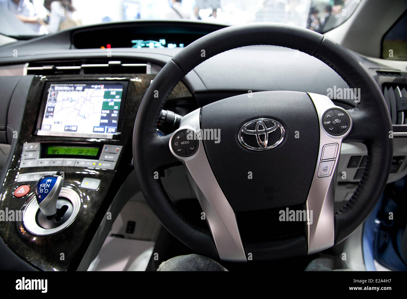 Tokyo, Japan. 18th June, 2014. – The Toyota Prius PHV (Plug-in Hybrid Vehicle) includes the new interactive navigation service 'T-Connect' which is compatible with smart phones at the Smart Community Japan 2014 in Tokyo Big Sight on June 18, 2014. The exhibition brings the latests products and technologies divided in 5 categories, 'Smart Community Exhibition', 'Biomass Expo', 'Next Generation Vehicle Exhibition, and newly-created 'Community Cloud 2014', which introduces technology for urban development. This year 229 enterprises and organizations shows their products from June 18th to 20th. (P Stock Photo