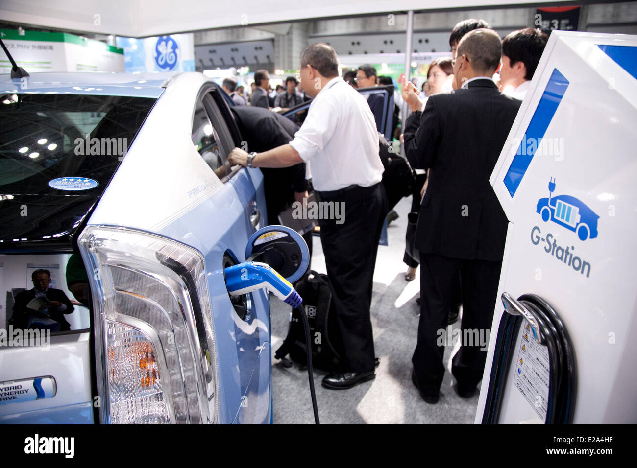 Tokyo, Japan. 18th June, 2014. – The Toyota Prius PHV (Plug-in Hybrid Vehicle) includes the new interactive navigation service 'T-Connect' which is compatible with smart phones at the Smart Community Japan 2014 in Tokyo Big Sight on June 18, 2014. The exhibition brings the latests products and technologies divided in 5 categories, 'Smart Community Exhibition', 'Biomass Expo', 'Next Generation Vehicle Exhibition, and newly-created 'Community Cloud 2014', which introduces technology for urban development. This year 229 enterprises and organizations shows their products from June 18th to 20th. (P Stock Photo